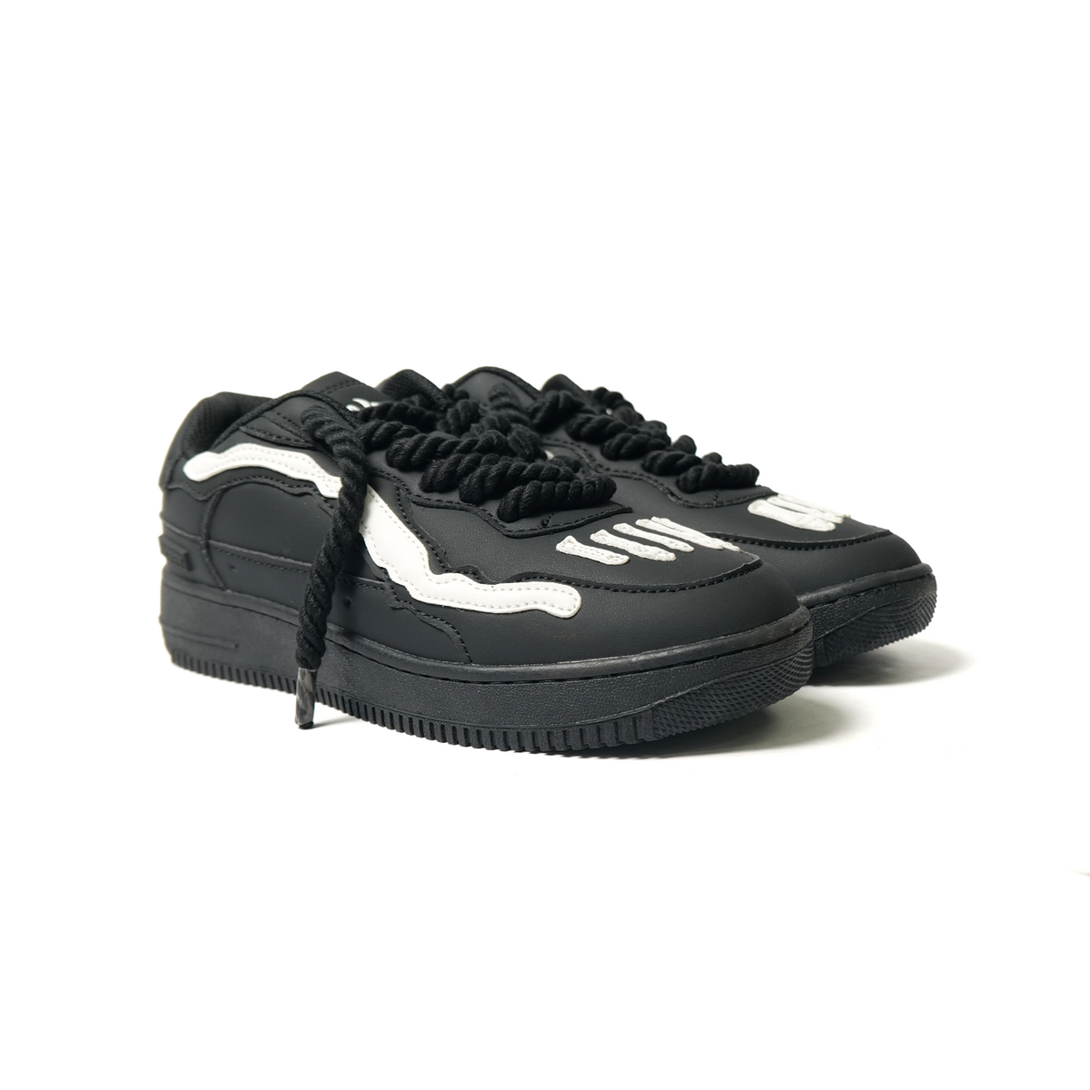 Watson Bones low-top sneaker in Tombstone, black and white