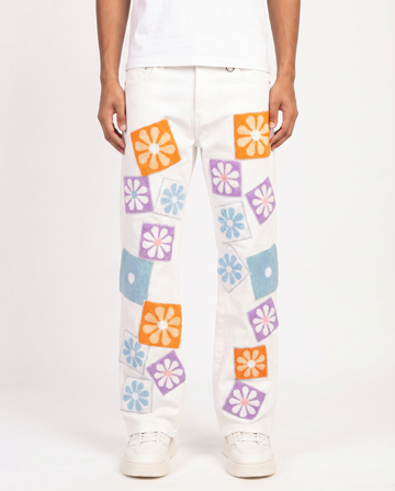 CHENILLE FLOWER STACKED DENIM PANTS (WHITE)